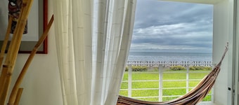 Bright and calm beachfront condo