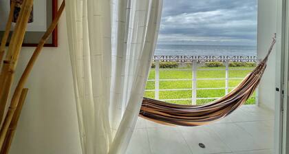 Bright and calm beachfront condo