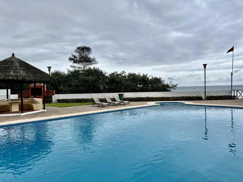 Bright and calm beachfront condo