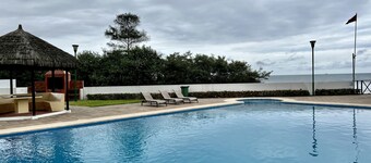 Bright and calm beachfront condo