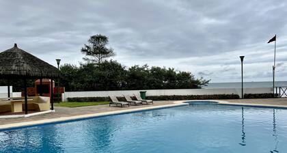Bright and calm beachfront condo