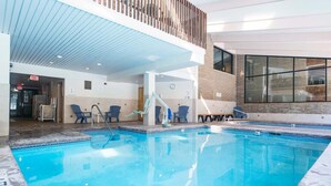 An indoor swimming pool with a clear view of the pool area, a wooden deck, and a view of the outside. - Discover Vail's Best Kept Secret. Great family location. Sleeps up to 8. (Vail)