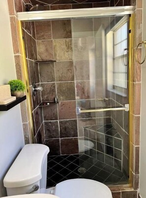 Shower, hair dryer, towels, soap