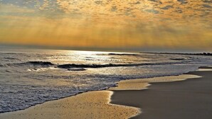 A beach with waves and a sunset. - BEACHFRONT
Gorgeous View!!!
OCEANFRONT
Sunday to Sunday (Eastpoint)