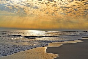 On the beach, sun-loungers, beach towels