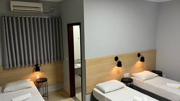 Deluxe Triple Room, 3 Twin Beds | Bed sheets