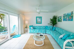 Deluxe Villa, 3 Bedrooms, Oceanfront | Living area - Galleon Villas by Hello Cayman Vacation (Seven Mile Beach)
