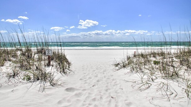 A beach with a sign that reads "KEEP OFF THE BEACH." - Pensacola Beach Home: 1 Block to Beach Access (Pensacola Beach)