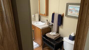 Combined shower/tub, hair dryer, towels, soap