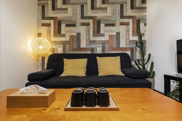 City Townhome | Living area | 55-inch flat-screen TV with digital channels, TV
