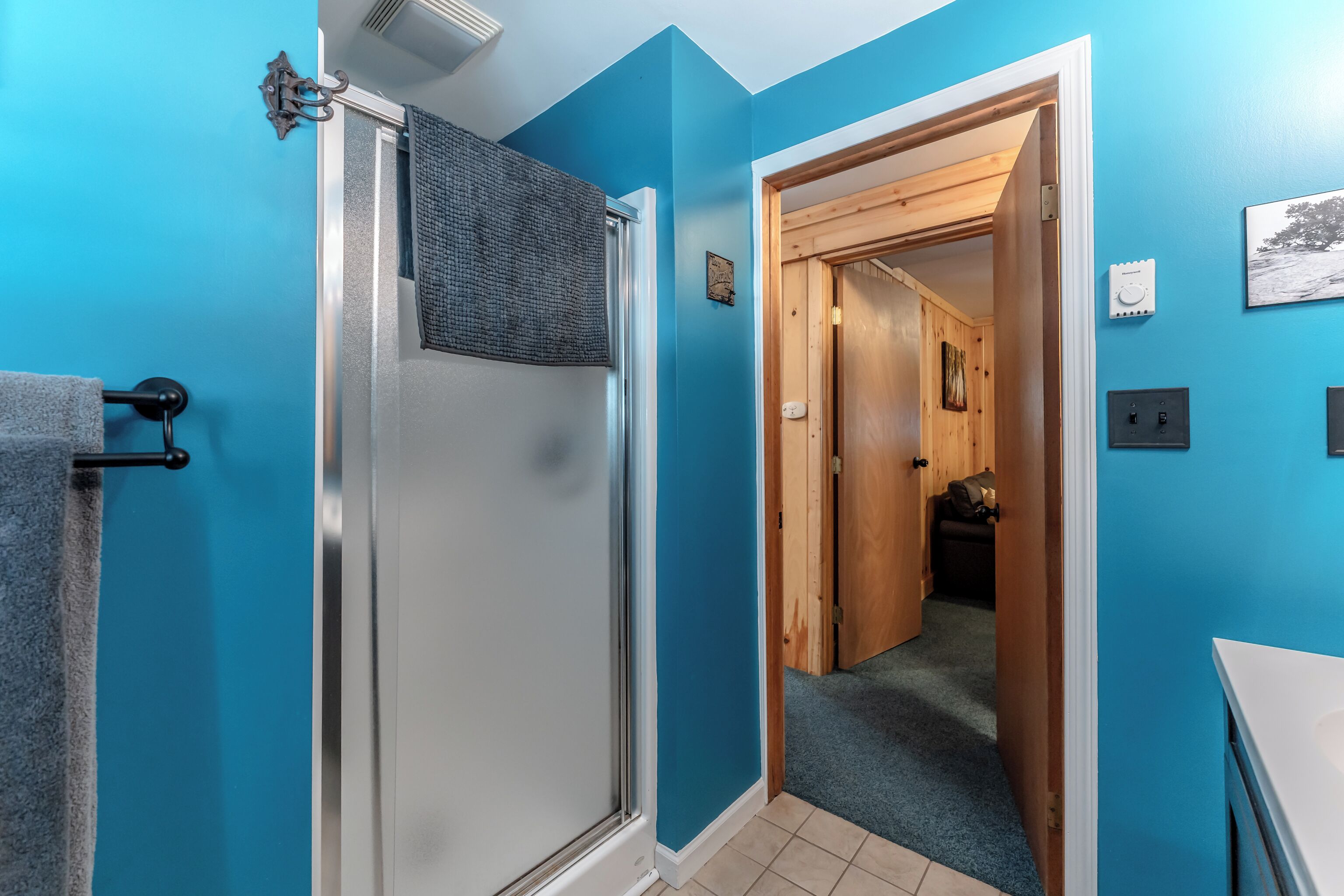 Low step shower for easier access.