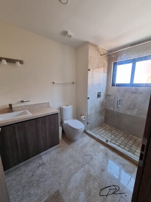 Shower, hair dryer, towels, soap