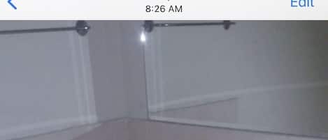 Bathtub, hair dryer, towels, soap