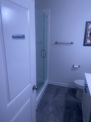 Combined shower/tub, hair dryer, towels, soap