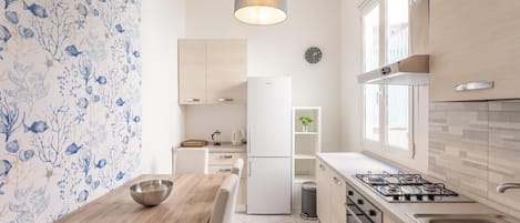 Apartment | Private kitchen | High chair, cookware/dishes/utensils, dining tables