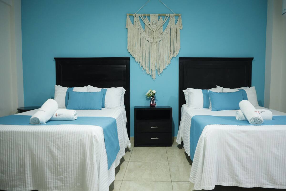 standard double room, 2 double beds | pillow-top beds, individually furnished, iron/ironing board, free wifi