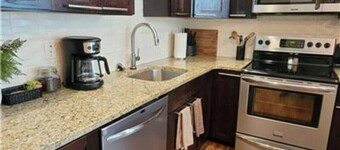 131 Cedar 2 · Chic 2BR Urban Retreat | Downtown Kalamazoo