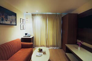 32-inch flat-screen TV with satellite channels, TV