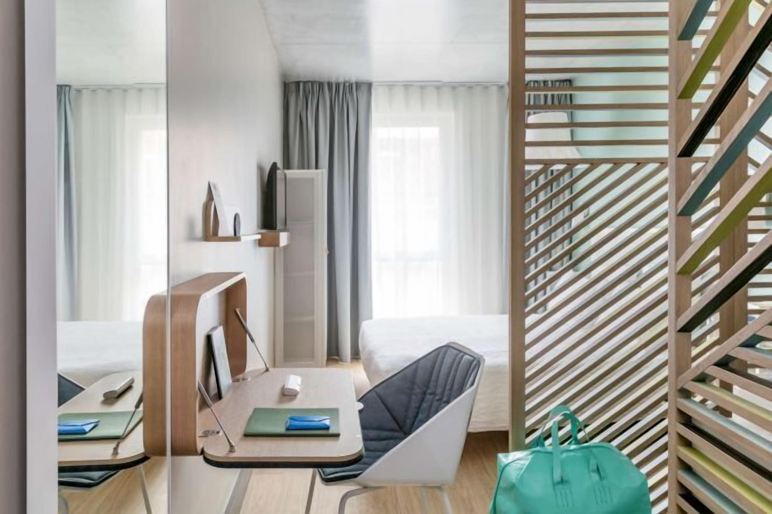 Premium bedding, down duvets, in-room safe, desk