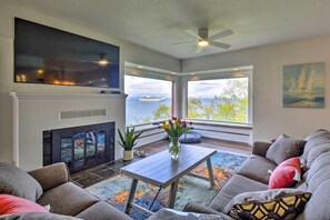 TV, fireplace, books - Chic Port Angeles Home w/ Oceanfront Balcony! (Port Angeles)