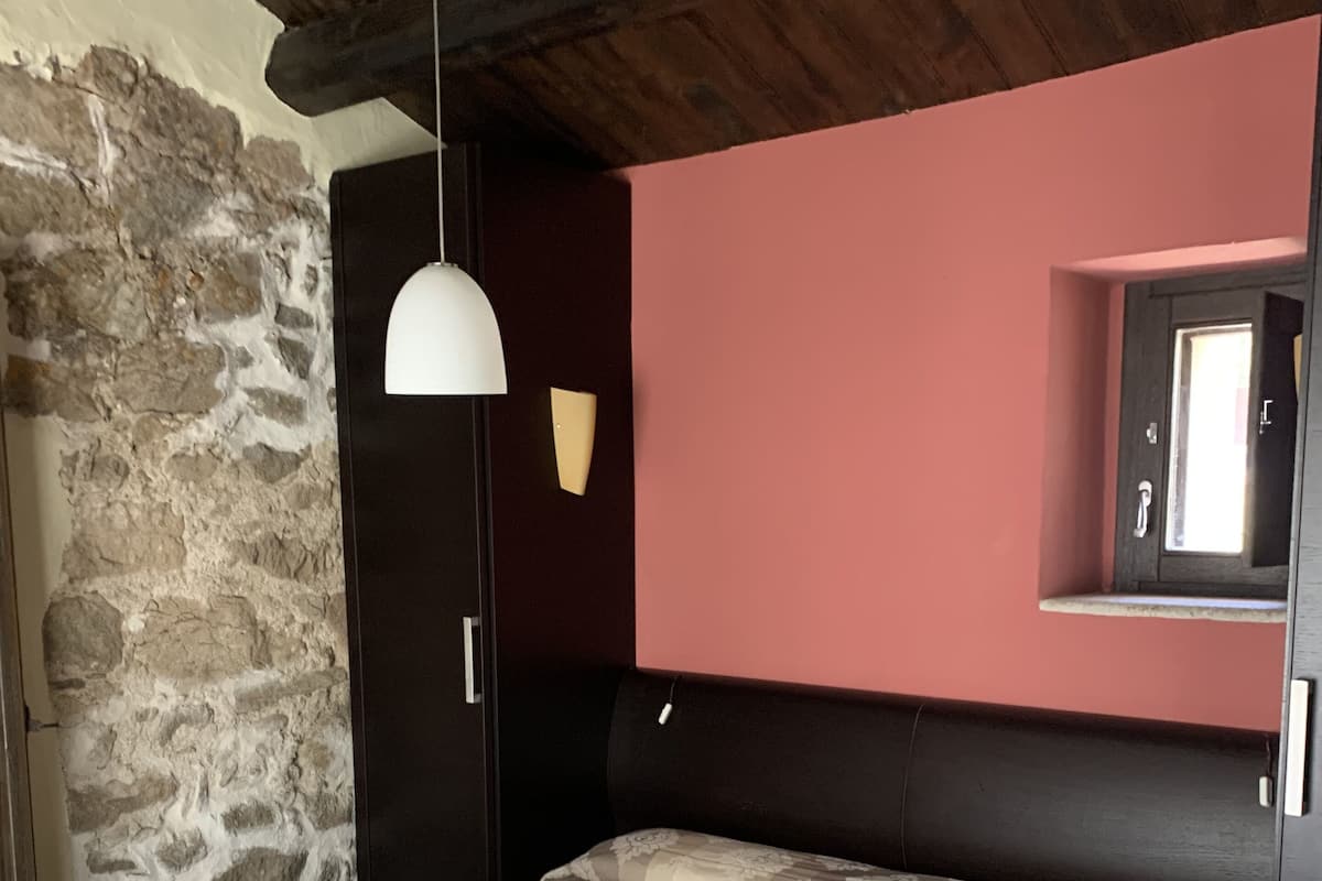 Comfort Apartment | Minibar, in-room safe, desk, laptop workspace
