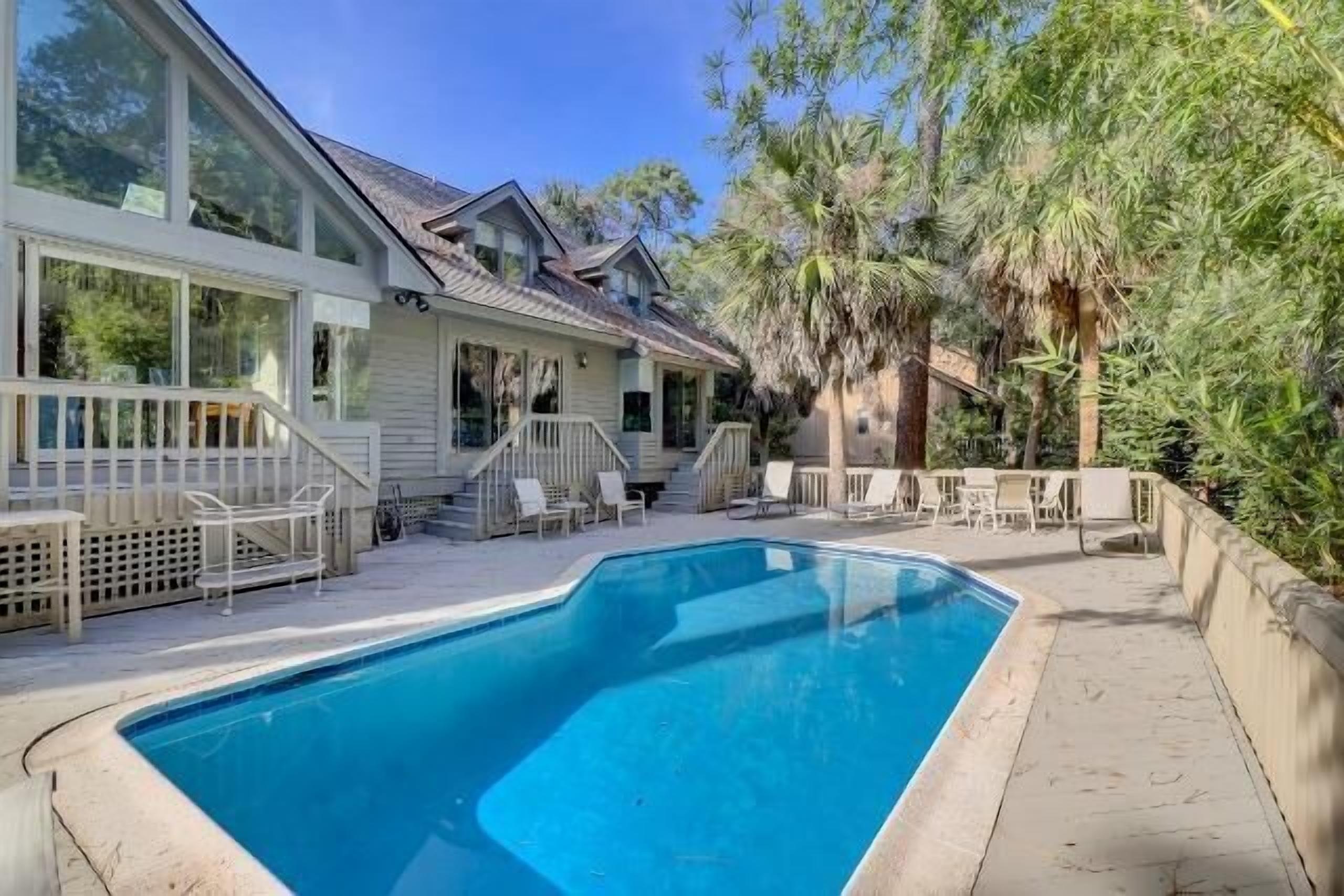 Prime location 4-Bdrm home w/ Private Pool, just steps to Beach & Golf Club