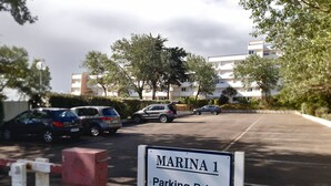 A private parking sign labeled "MARINA 1" with a reserved parking area for owners. - SEAFRONT APARTMENT 60 M2 AND LOGGIA (Saint-Jean-de-Monts)