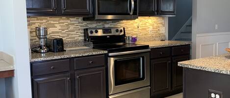 Fridge, microwave, oven, dishwasher