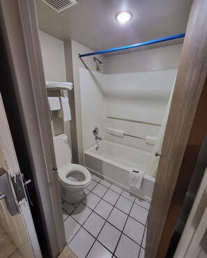 Basic Single Room, 1 King Bed, Smoking | Bathroom | Combined shower/tub, towels - Hallmark Inn and Suites (San Antonio)