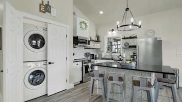 Coffee/tea maker, fridge, microwave, oven