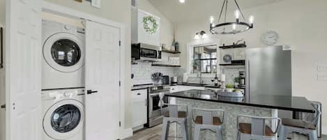 Coffee/tea maker, fridge, microwave, oven
