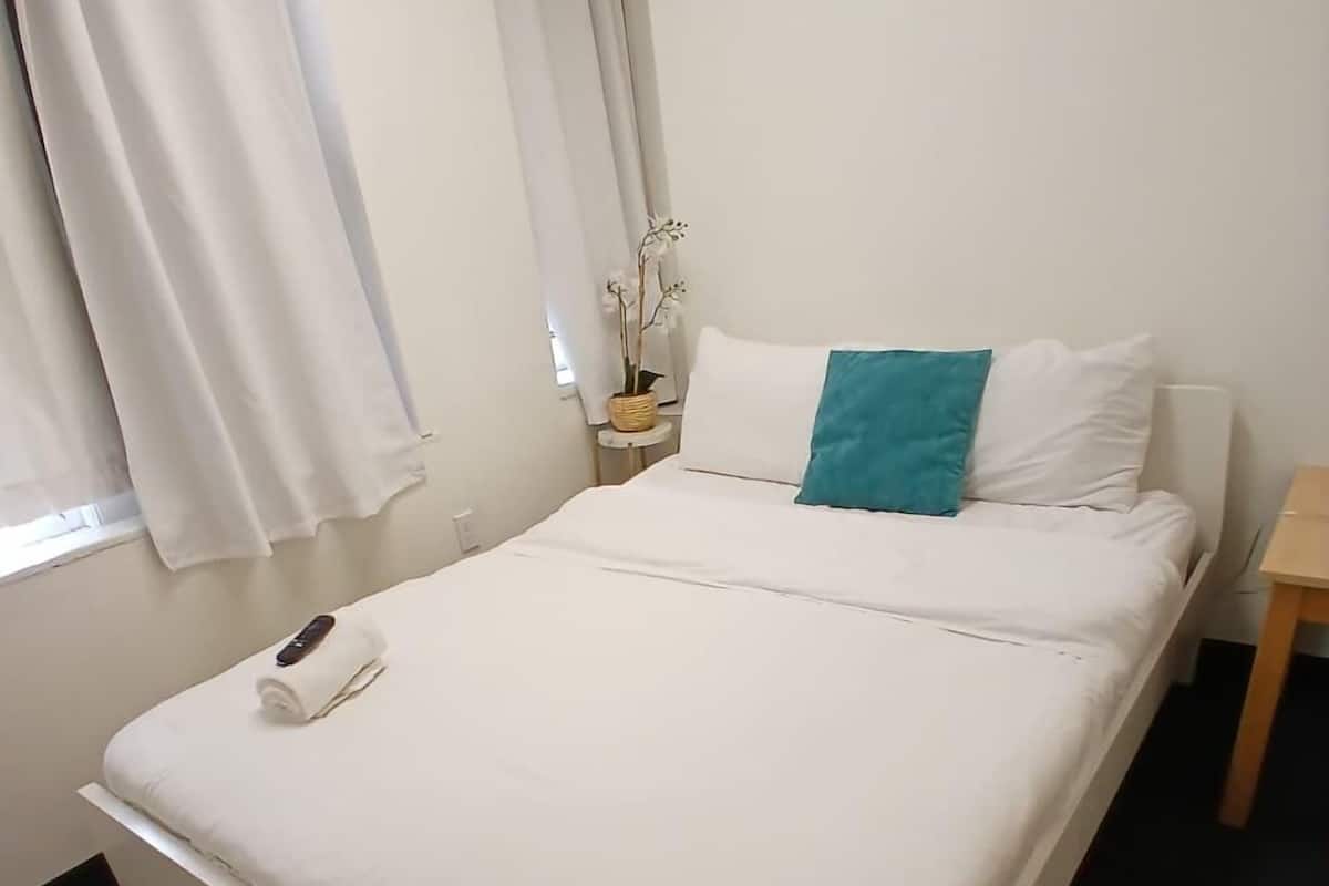 Memory foam beds, desk, laptop workspace, WiFi (free)