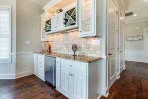 Enjoy cooking in this well-appointed kitchen with a central island and dishwasher.