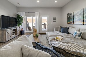 Smart TV, fireplace, DVD player, foosball