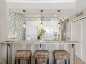 Fridge, microwave, dishwasher, coffee/tea maker - Conched Out - Feel the ocean breezes as you relax on the deck overlooking the lovely Carolina Beach coastline by RedAwning (Carolina Beach)