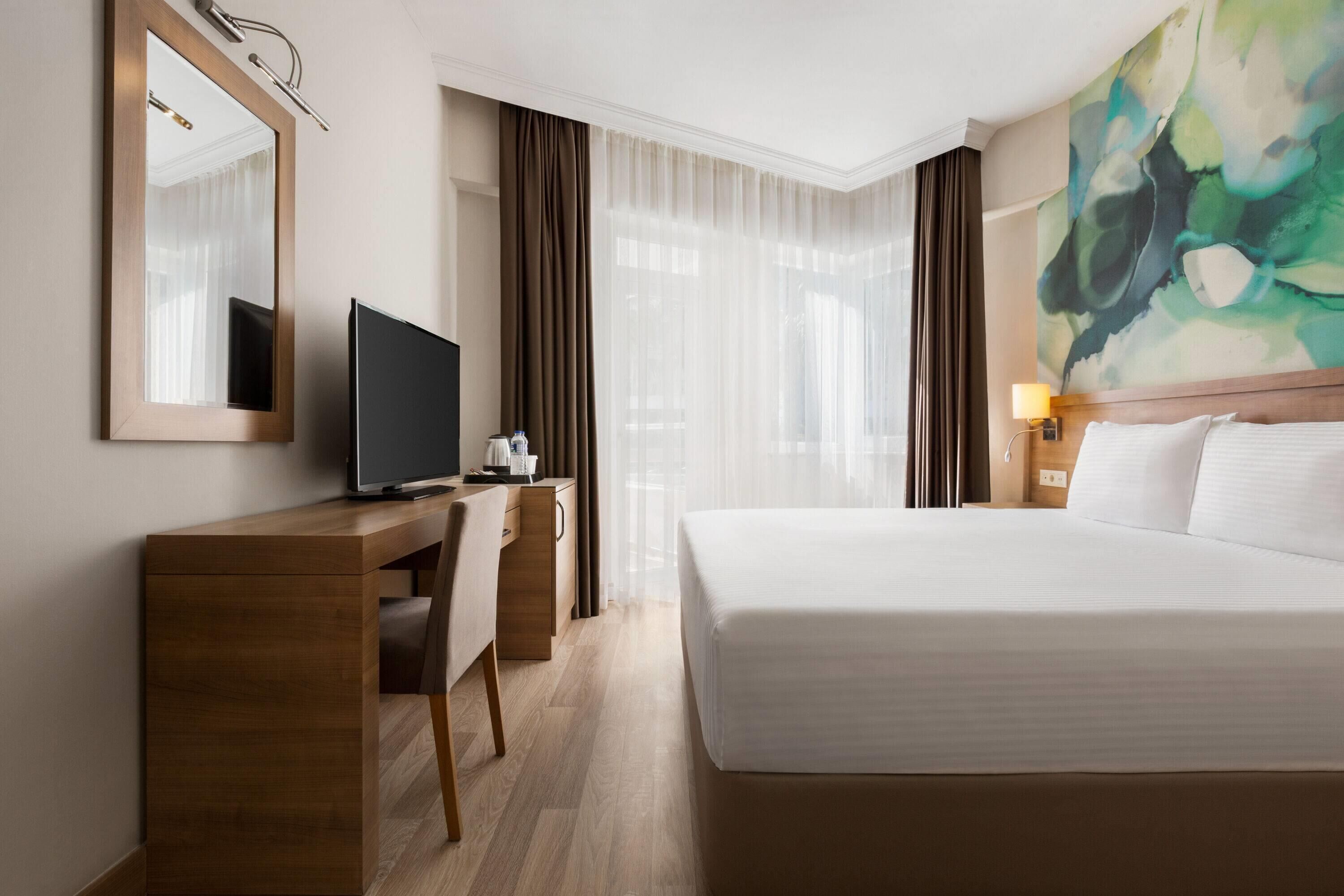 Articles gratuits dans le mini-bar, fer et planche à repasser