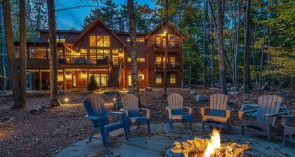 Ultimate luxury experience on Winnipesaukee Sleeps 18 Huge Beach