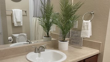 Combined shower/tub