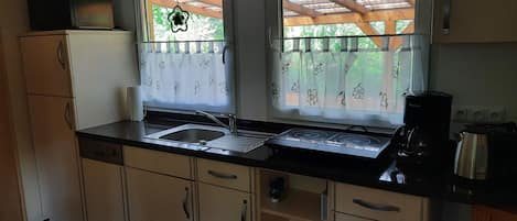 Fridge, microwave, dishwasher, coffee/tea maker