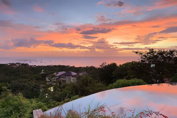 Infinity pool view to beach