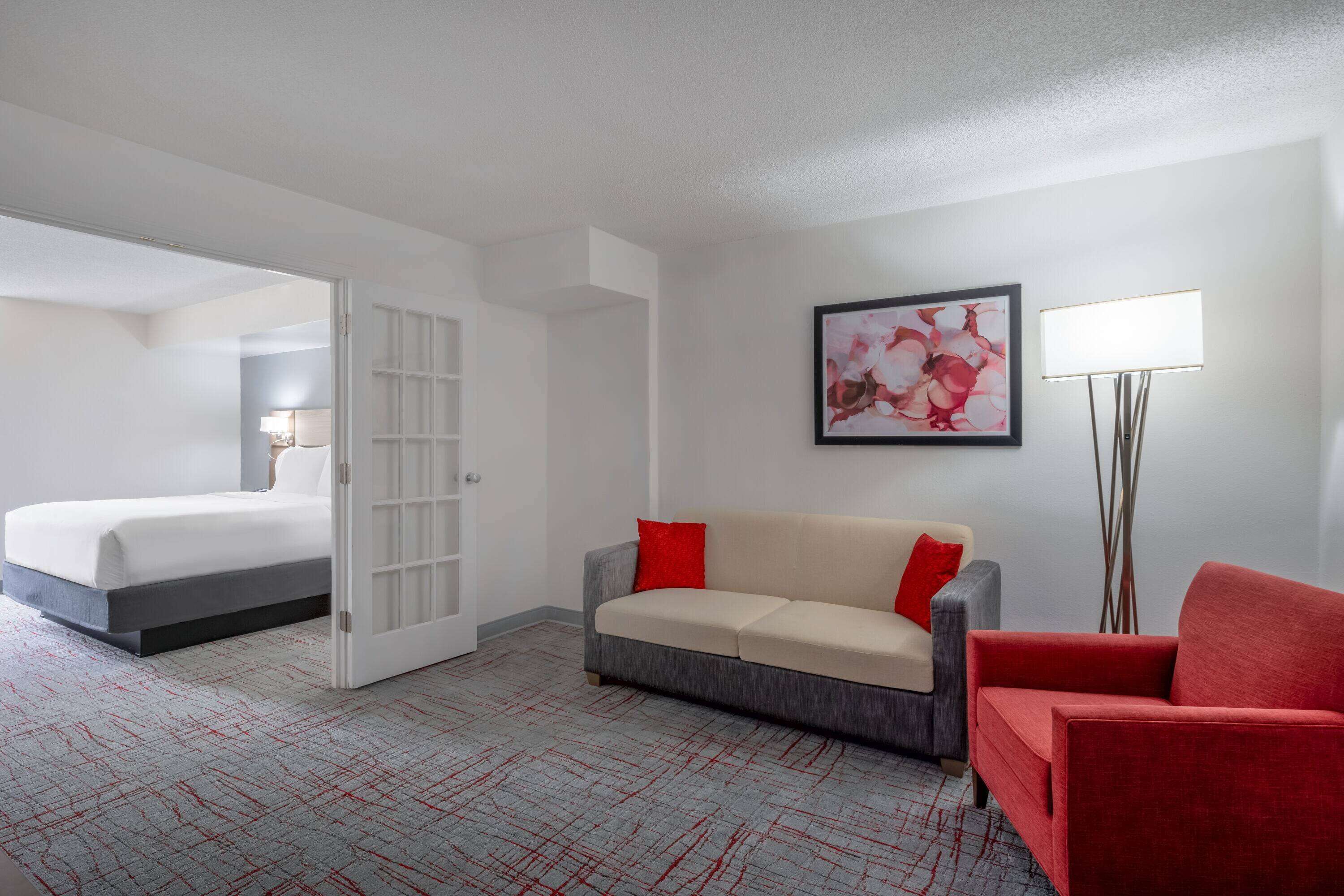 Desk, laptop workspace, blackout drapes, iron/ironing board