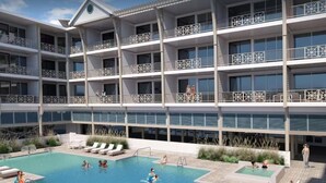 Un hôtel à plusieurs étages doté d’une piscine centrale, entourée d’espaces de détente et de coins salon extérieurs.