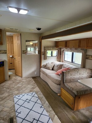 Living area - Cozy RV - Apple Orchard, On the broad river! Kid friendly! Very Clean!  (Black Mountain)