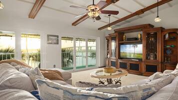 Condo, Multiple Beds, Balcony | Living area | TV