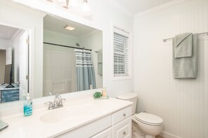 Combined shower/tub, hair dryer, towels, soap