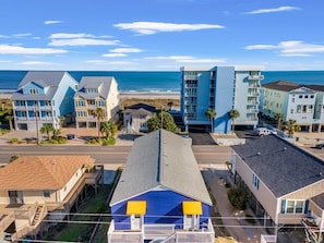 Residents enjoy scenic views of the ocean from their homes in this coastal area with a mix of modern and traditional architecture.