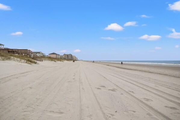 Guests can enjoy access to a sandy beach.