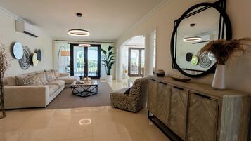 Superior Villa, 3 Bedrooms, Partial Ocean View | Living area | 55-inch Smart TV with cable channels, TV