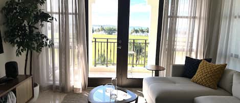 Premier Penthouse | Living area | 55-inch Smart TV with cable channels, TV