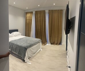 3 bedrooms, desk, iron/ironing board, travel cot